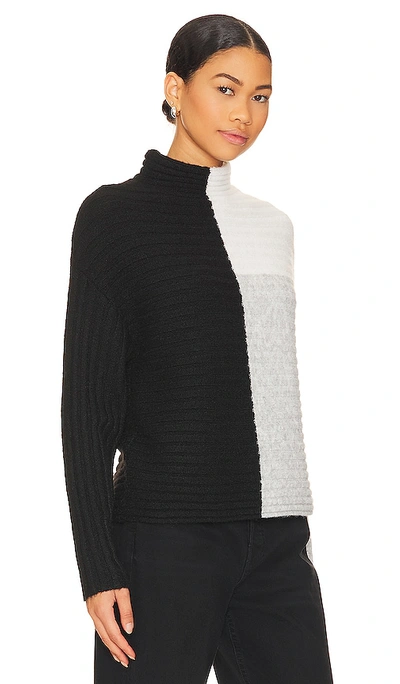 Central Park West Maura Color Block Turtleneck Sweater In Black