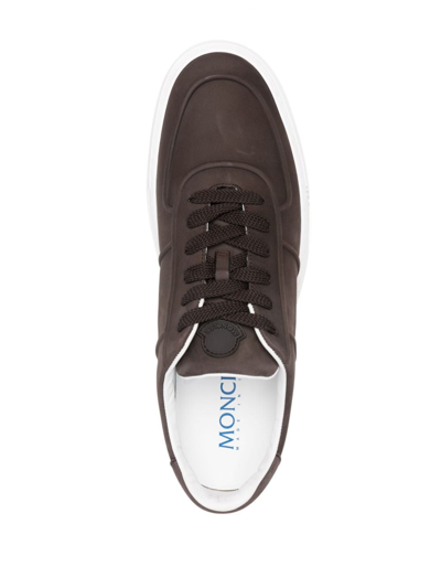 Shop Moncler Logo-debossed Leather Sneakers In 褐色