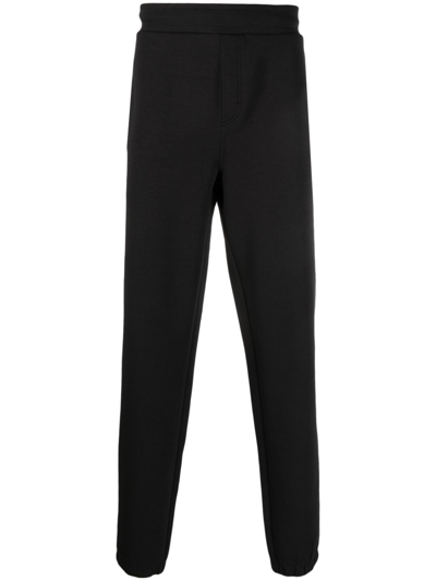 Shop Calvin Klein Logo-debossed Track Pants In Black