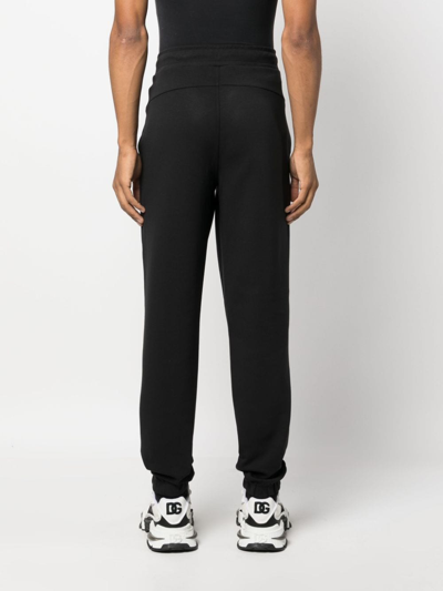 Shop Calvin Klein Logo-debossed Track Pants In Black