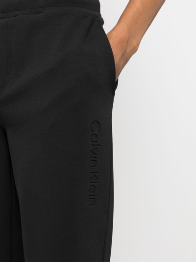 Shop Calvin Klein Logo-debossed Track Pants In Black