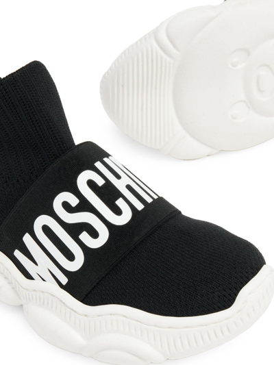 Shop Moschino Logo-print Slip-on Sneakers In Black