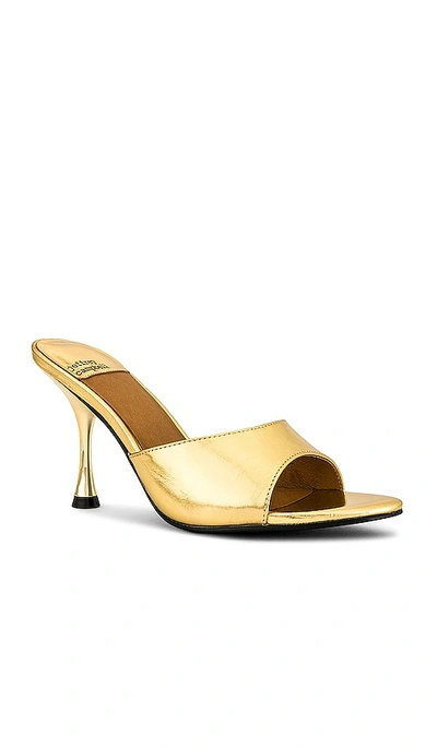 Shop Jeffrey Campbell Agent Mules In Metallic Gold