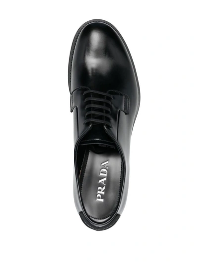 Shop Prada Lace-up Leather Derby Shoes In Nero