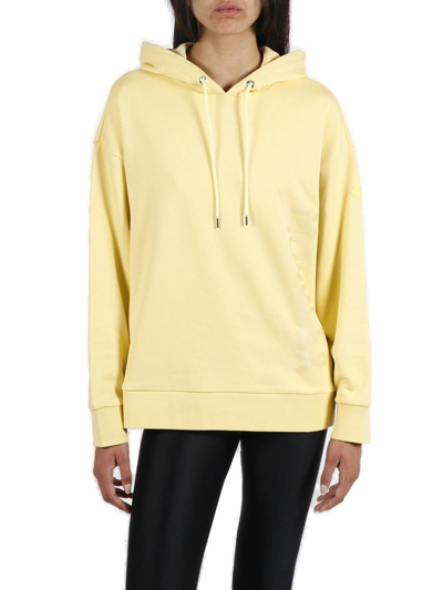 Shop Moncler Drawstring Long-sleeved Hoodie In Giallo