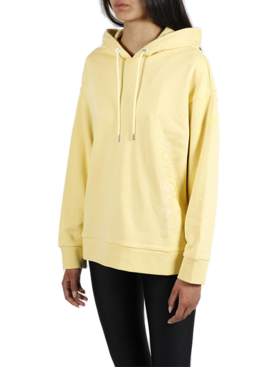 Shop Moncler Drawstring Long-sleeved Hoodie In Giallo