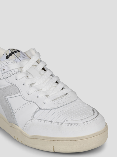 Shop Diadora B.560 Used Sneakers In White