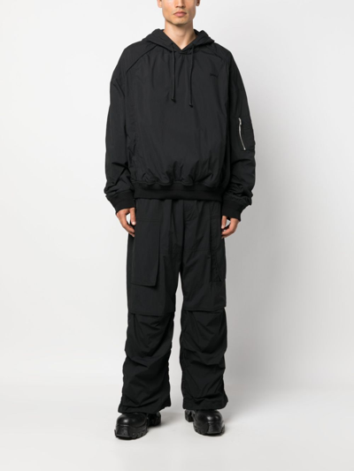 Shop Juunj Hooded Slip-on Lightweight Jacket In Black