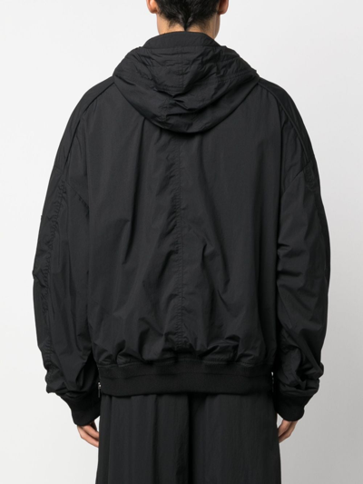 Shop Juunj Hooded Slip-on Lightweight Jacket In Black