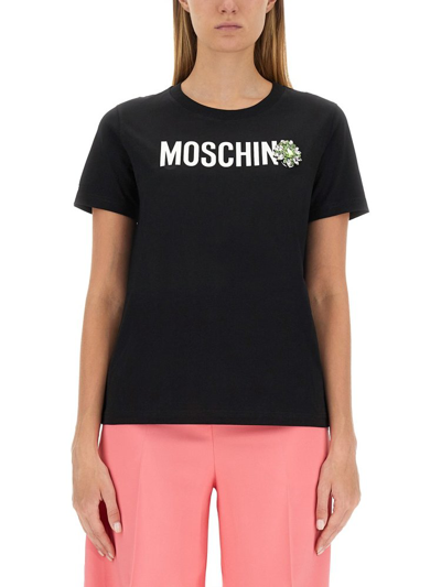 Shop Moschino Logo Printed Brooch In Black