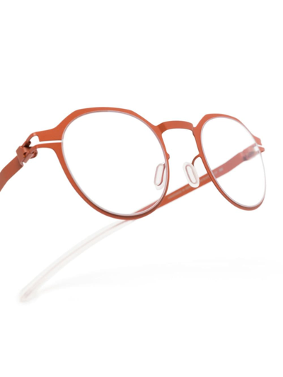 Shop Mykita Round-frame Titanium Glasses In Orange