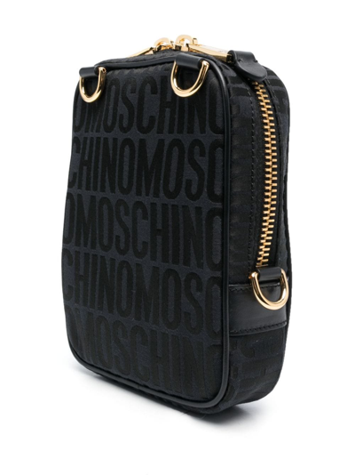 Shop Moschino Logo-print Crossbody Bag In Black