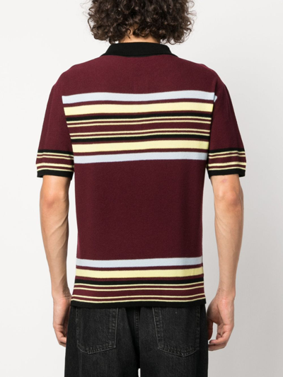 Shop Wales Bonner Wander Striped Wool Polo Shirt In Red