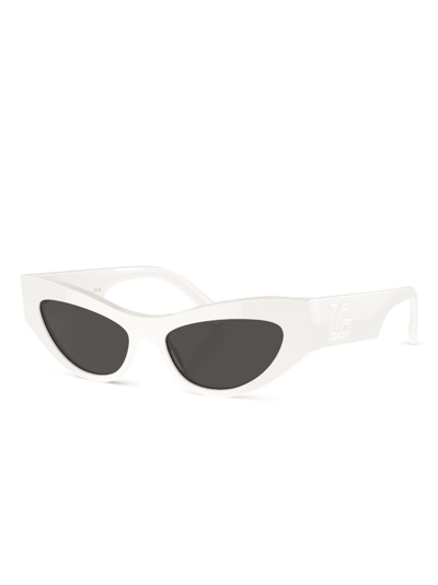 Shop Dolce & Gabbana Oval-frame Sunglasses In White