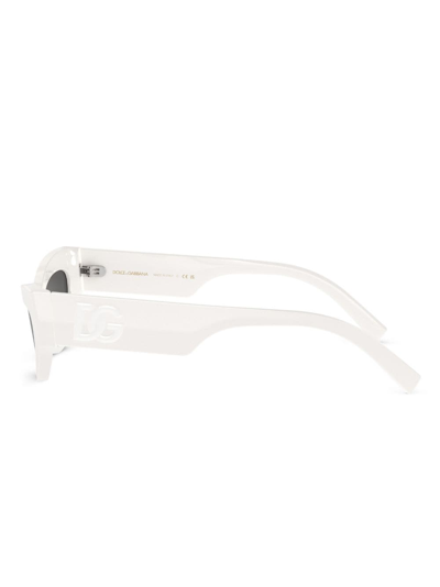 Shop Dolce & Gabbana Oval-frame Sunglasses In White