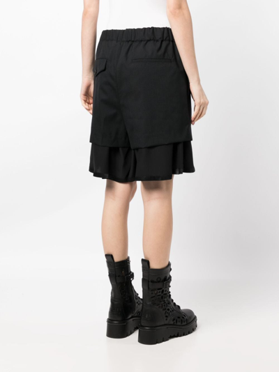Shop Noir Kei Ninomiya Layered Wool Shorts In Schwarz