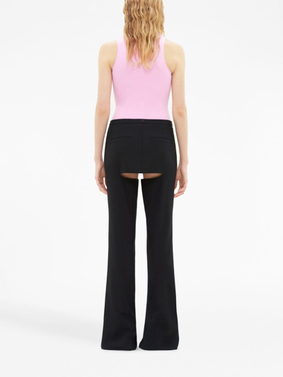 Shop Courrèges Chaps Flared Tailored Trousers In Black