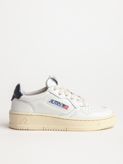 Shop Autry Low Top Sneakers In White