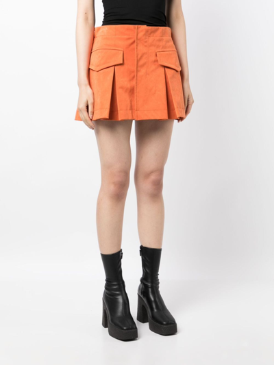 Shop Sacai Box-pleated Mini Shorts In Orange