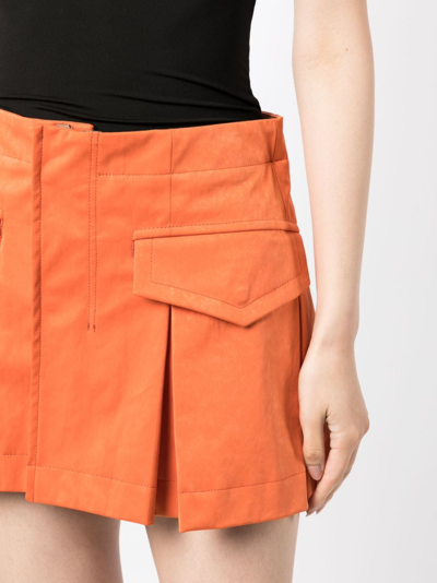 Shop Sacai Box-pleated Mini Shorts In Orange