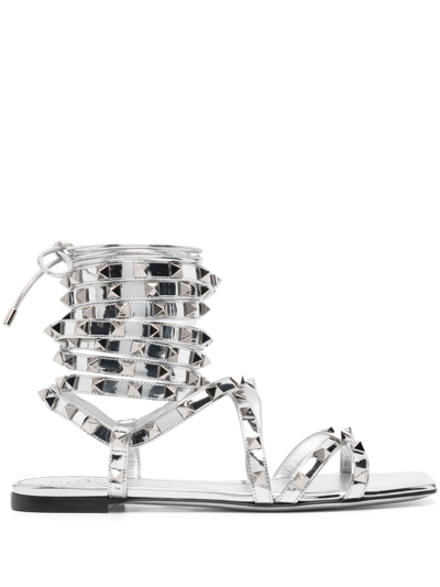 Shop Valentino Rockstud Gladiator Metallic Leather Sandals In Silver