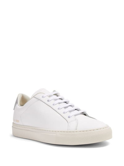 Shop Common Projects Retro Leather Sneakers In White