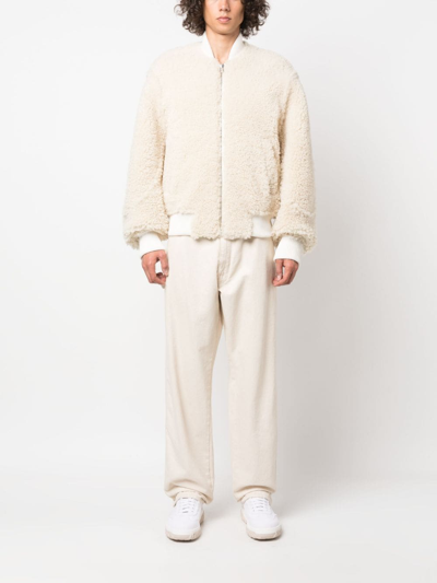 Shop Jacquemus Le Blouson Pilou Shearling Bomber Jacket In White