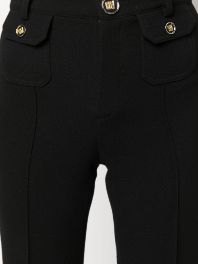 Shop Giambattista Valli Logo-embossed Button Flared Trousers In Black