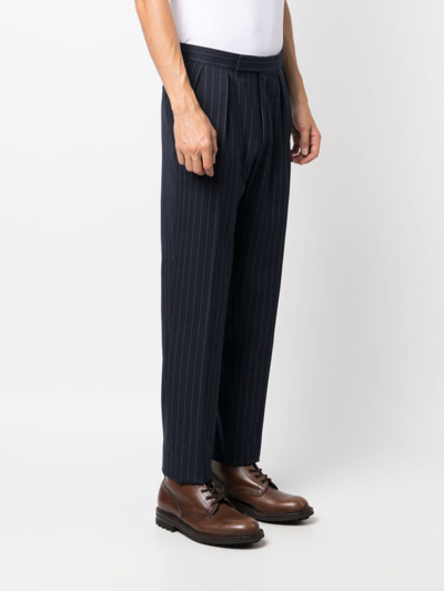 Shop Polo Ralph Lauren Pinstripe-pattern Slim-cut Trousers In Blue