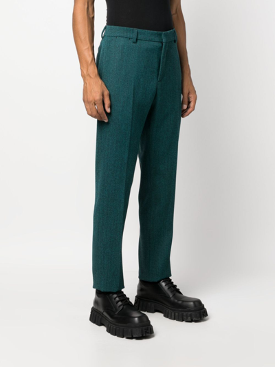 Shop Versace Wool-blend Slim-leg Trousers In Green