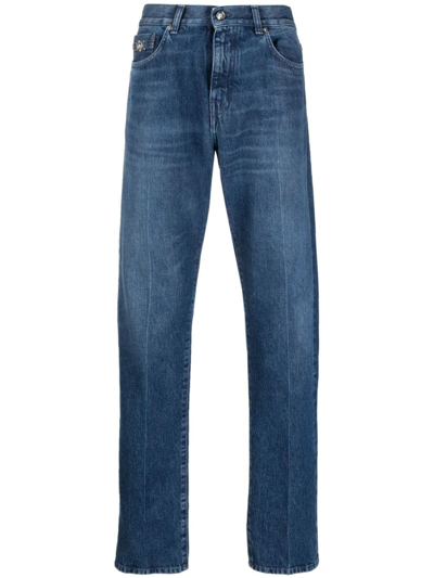 Shop Versace Straight-leg Mid-rise Jeans In Blau