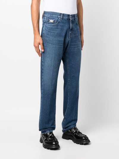 Shop Versace Straight-leg Mid-rise Jeans In Blau