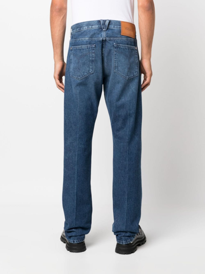 Shop Versace Straight-leg Mid-rise Jeans In Blau