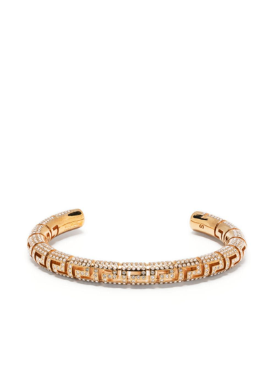 Shop Versace Greca Crystal-embellished Cuff Bracelet In Gold