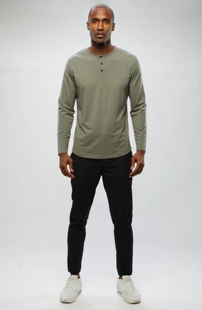 Shop Cuts Ao Curved Hem Long Sleeve Henley In Carbon