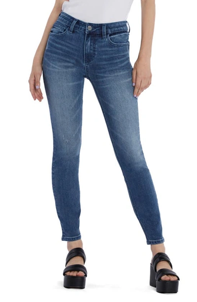 Shop Hint Of Blu Vera Mid Rise Skinny Jeans In Spin Blue