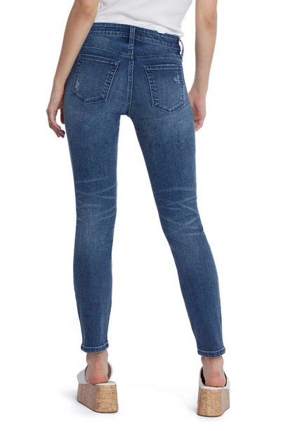 Shop Hint Of Blu Vera Mid Rise Skinny Jeans In Spin Blue