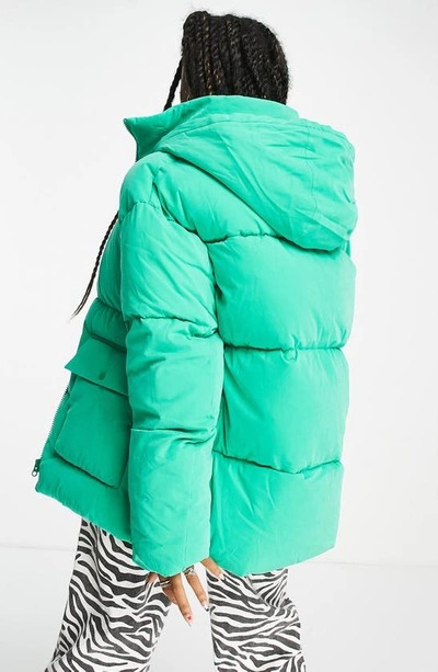 Shop Asos Design Peached Hooded Puffer Jacket In Medium Green