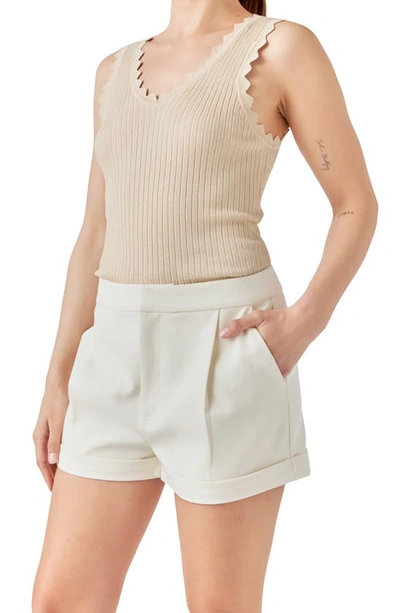 Endless Rose Pleated Low Rise Shorts In Ecru