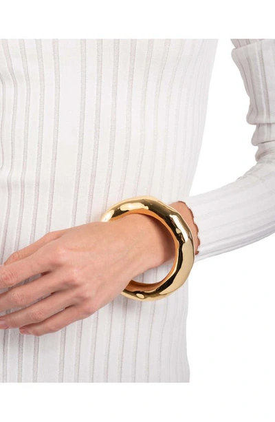 Shop Alexis Bittar Wide Molten Bangle Bracelet In Gold