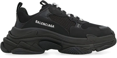 Shop Balenciaga Triple S Low-top Sneakers In Black