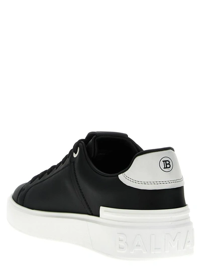 Shop Balmain 'b-court' Sneakers In White/black