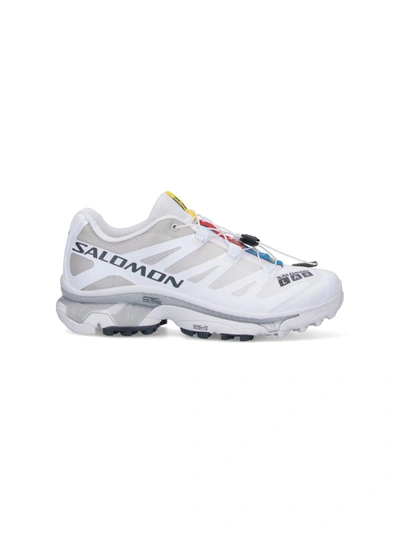 Shop Salomon Sneakers In White