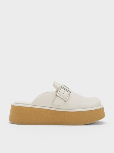 Shop Charles & Keith - Textured Buckled Flatform Mules In Cream