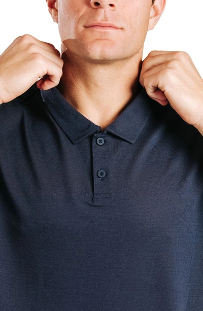 Western Rise Limitless Merino Wool Blend Polo In Navy