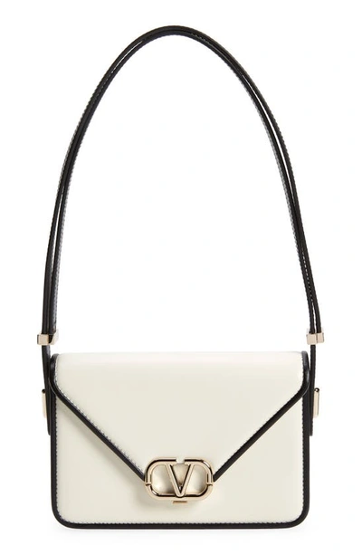 Shop Valentino Small Vlogo Leather Shoulder Bag In A81 Ivory-nero