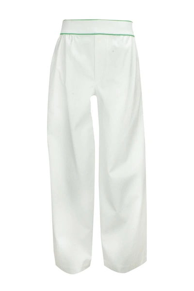 Shop Bottega Veneta Trousers In White