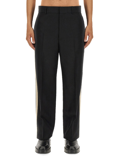 Shop Palm Angels Pants With Logo Band In Black