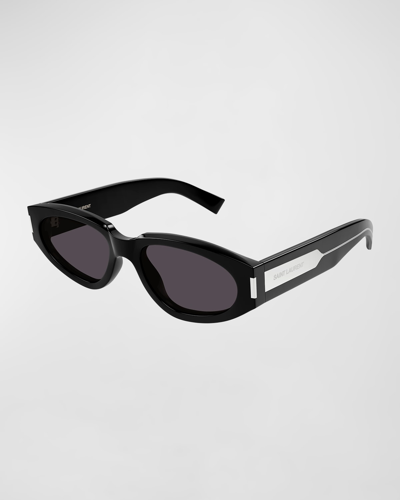 Shop Saint Laurent Engraved Logo Acetate Oval Sunglasses In Shiny Solid Black