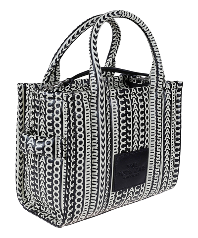 Shop Marc Jacobs The Monogram Handbag In Black